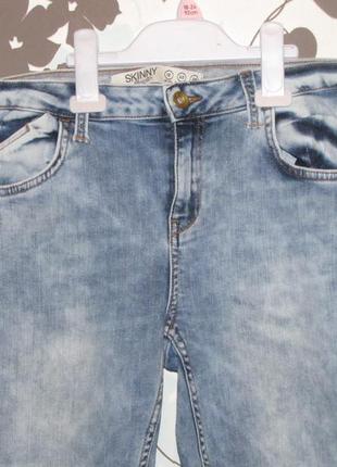 Модні укорочені джинси4 фото