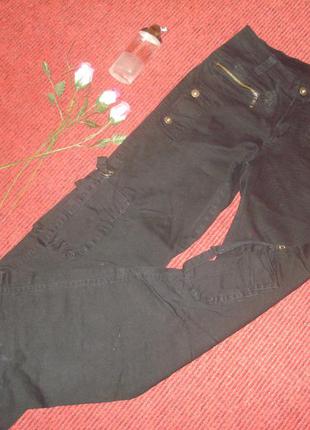 Фірмові чорні штани з кишенями1 фото