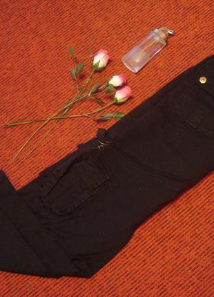 Фірмові чорні штани з кишенями4 фото