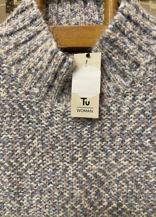 Очень красивый и стильный брендовый вязаный свитер.1 фото