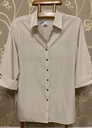 Очень красивая и стильная брендовая блузка в полоску.