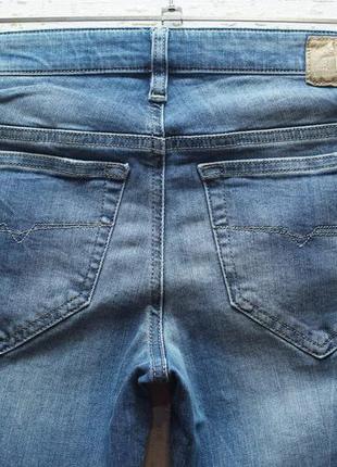 Женские джинсы diesel голубого цвета7 фото
