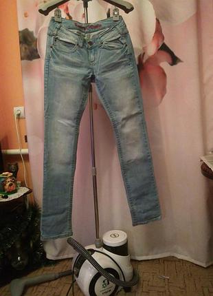 Завужені джинси