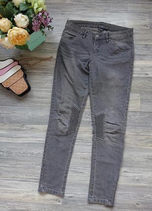 Серые женские джинсы с молниями внизу р.м/l2 фото