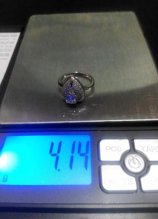 Серебряное кольцо с фианитами в форме листа 17,5 размер7 фото