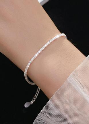 Жіночий срібний браслет з кубічним цирконієм покритий родієм