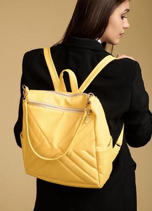Жіночий рюкзак-сумка trinity строчений жовтий1 фото