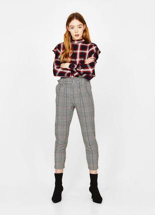Брюки в клітинку bershka