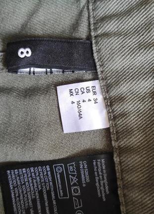 Джинсовая короткая мини юбка хаки на молнии спереди5 фото