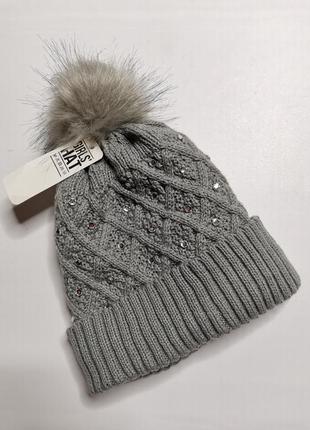 Теплая зимняя вязаная шапка на флисе с балабоном1 фото