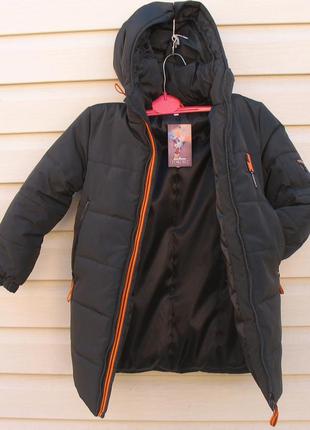 Довга куртка   ( пальто) зима.розмір 134,5 фото