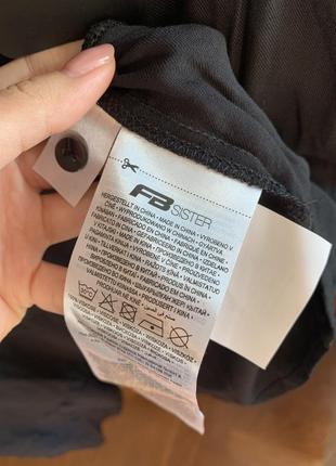 Сарафан на бретельках: чорне плаття трапеція