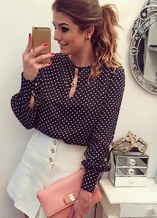 Жіноча блузка в горошок