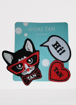 Значки брендові андре тан, ціна за фото
