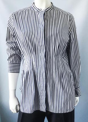 Хлопчатобумажная рубашка в полоску бренда cos, швеция.