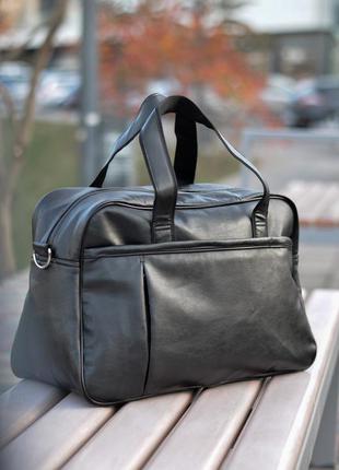 Чорна унісекс сумка з екошкіри для тренувань, подорожей чоловіча дорожня сумка на довгих ручках