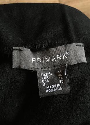 Натуральный черный комбинезон с белыми лампасами на брюках3 фото