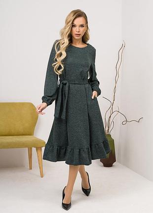 Зелена трикотажна сукня з нижнім воланом