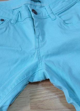 Узкие мятные фирменные джинсы скинни.4 фото