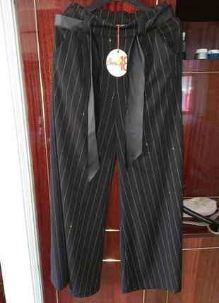 Штани клешь