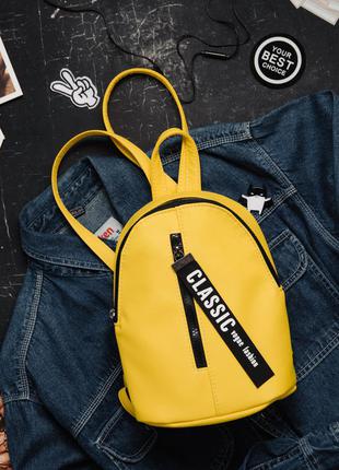 Жовтий підлітковий місткий маленький рюкзак для прогулянки9 фото
