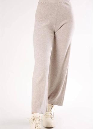 Бежеві трикотажні брюки,італія