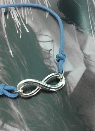 Браслет блакитна нитка символ нескінченності avon4 фото