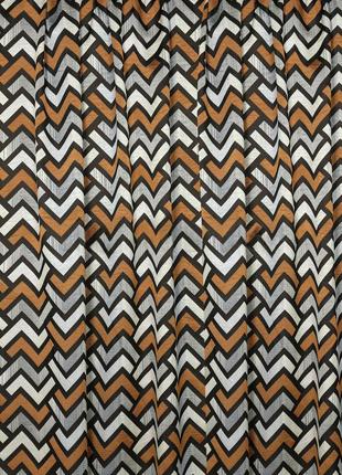 Портьерная ткань для штор жаккард коричнево-оранжевого цвета с геометрическим рисунком