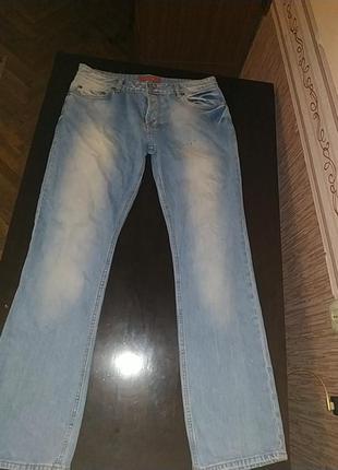 Фірмові щільні джинси на гудзиках