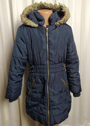 Тепленьке зимове пальто. б/у. 7-8 років вік1 фото