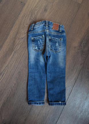 Штаны джинсы потертые рваные2 фото
