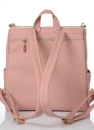 Стльный женский вместительный пудровый рюкзак-сумка городской, повседневный из экокожи пудра (светло-розовый)10 фото