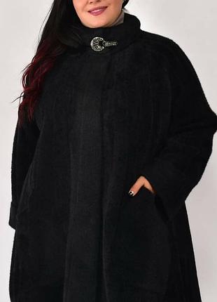 Шикарное палтто в стиле пончо,вниз расклешонное,на ог примерно до 140.