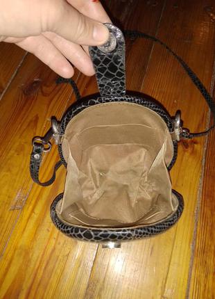 Цікава маленька сумочка під зміїну шкіру6 фото