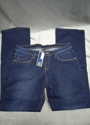 Жіночі джинсові стрейчеві штани, євр.рр.40,42 темно-синього кольору.2 фото