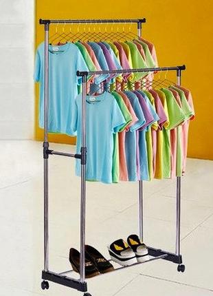 Универсальная двойная напольная передвижная вешалка стойка для одежды.