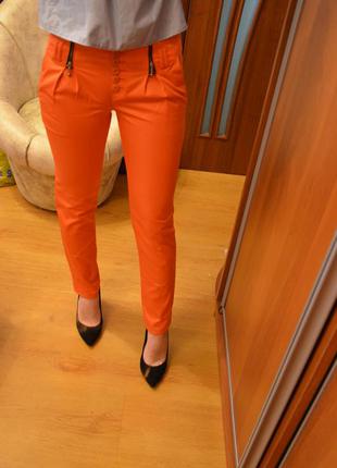 Атласні штани теракотового кольору з оранжевим відтінком