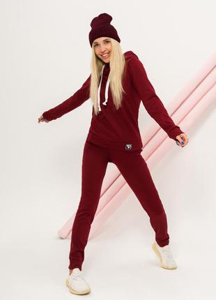 Бордовий костюм на флісі з хутряною обробкою капюшона