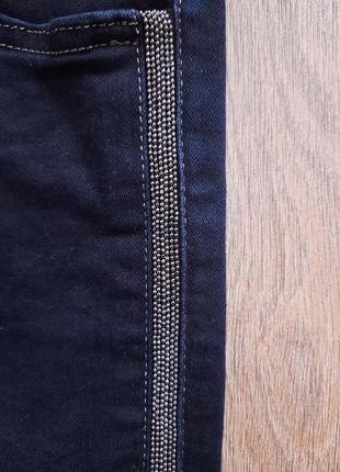 Красивейшие  брюки джинсы на  размер 42-44.указан размер 27.2 фото