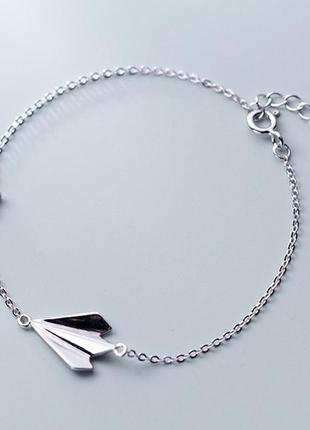 Срібний браслет з літаком і зірочкою жіночий срібло1 фото
