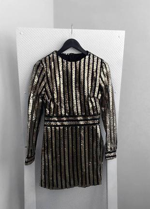 Ошатне жіноче плаття в паєтки