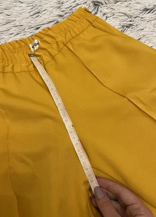 Яркие желтые брюки4 фото