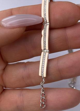 Срібний браслет з золотими пластинами