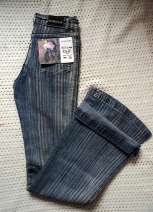 Розкльошені стрейчеві джинси від delfin. туреччина. w25l32..демисезон3 фото