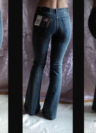 Расклешенные  стрейчевые джинсы от delfin. турция. w25l32..демисезон
