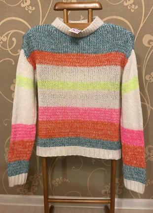 Очень красивый и стильный брендовый вязаный свитер в полоску.9 фото