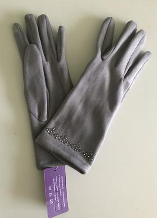 Сірі рукавички. знижка.1 фото