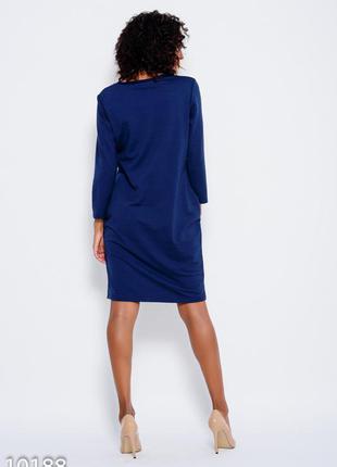 Темно-синя трикотажна сукня з довгими рукавами і кишенями3 фото