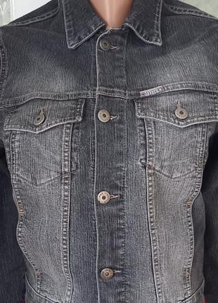 Нова джинсова стрейчева куртка розміру s.1 фото