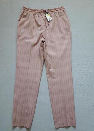 Незрівнянні стрейчеві пудрові штани в смужку primark
